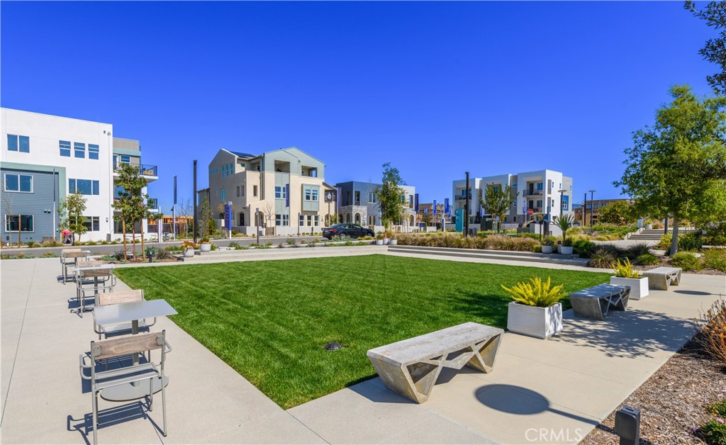 163 Restore Irvine, CA 92618 - Photo 35 of 45 a view of a patio with couches and a table and chairs