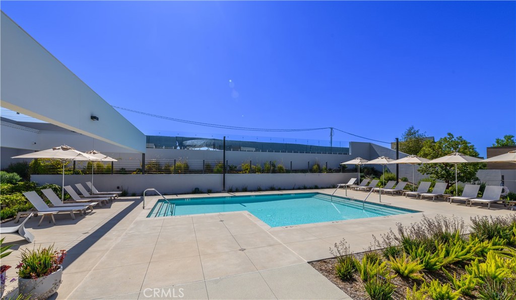 163 Restore Irvine, CA 92618 - Photo 36 of 45 a view of an outdoor space and swimming pool