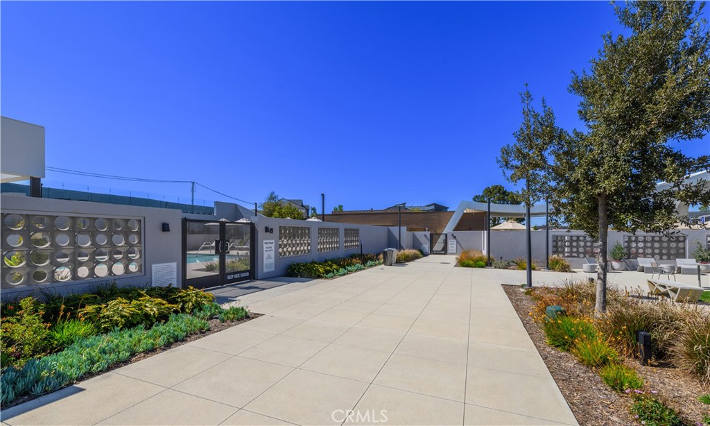 163 Restore Irvine, CA 92618 - Photo 39 of 45 a view of a patio with a table and chairs