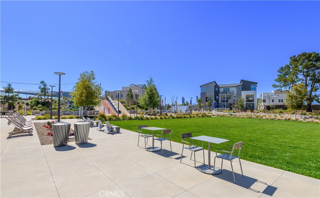 163 Restore Irvine, CA 92618 - Photo 44 of 45 a view of a patio with a table and chairs