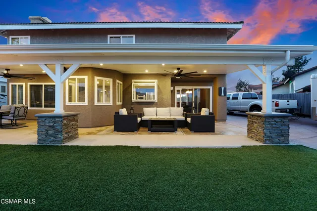 a view of a house with a big yard