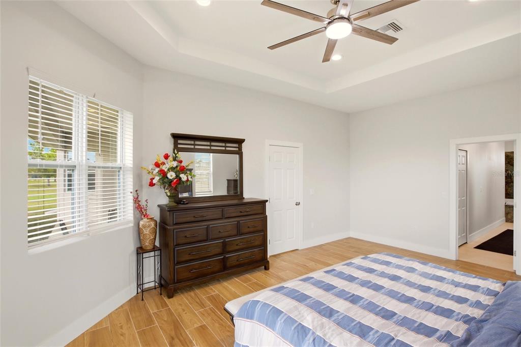 10080 Wauchula Road Myakka City, FL 34251 - Photo 19 of 55 a bed room with a bed and a window