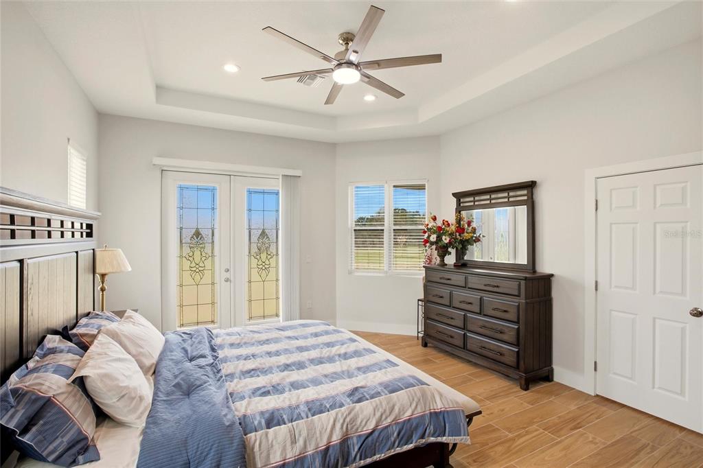 10080 Wauchula Road Myakka City, FL 34251 - Photo 21 of 55 a bedroom with a bed and dresser