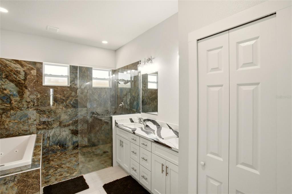 10080 Wauchula Road Myakka City, FL 34251 - Photo 22 of 55 a bathroom with a shower and a sink