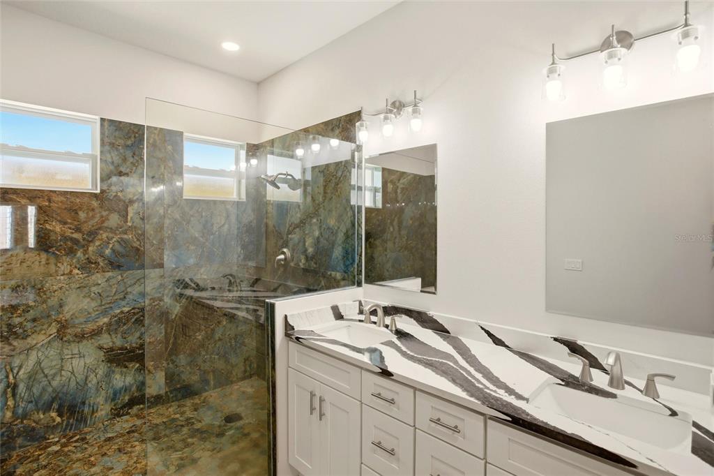 10080 Wauchula Road Myakka City, FL 34251 - Photo 23 of 55 a bathroom with a sink and a mirror
