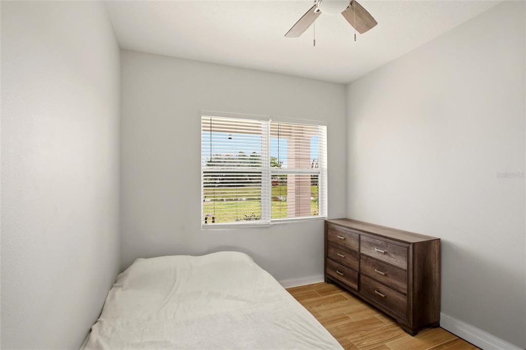 10080 Wauchula Road Myakka City, FL 34251 - Photo 26 of 55 a bedroom with a bed and a window