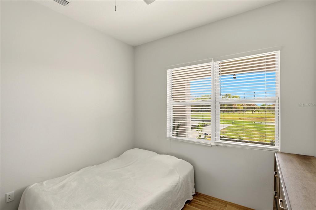 10080 Wauchula Road Myakka City, FL 34251 - Photo 27 of 55 a bedroom with a bed and a window