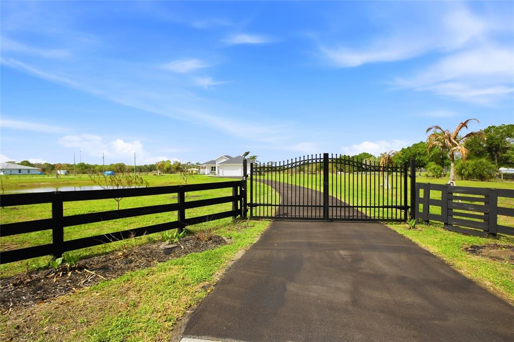 10080 Wauchula Road Myakka City, FL 34251 - Photo 3 of 55 a view of park with wooden fence