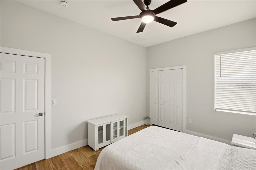 10080 Wauchula Road Myakka City, FL 34251 - Photo 32 of 55 a bedroom with a bed and a window