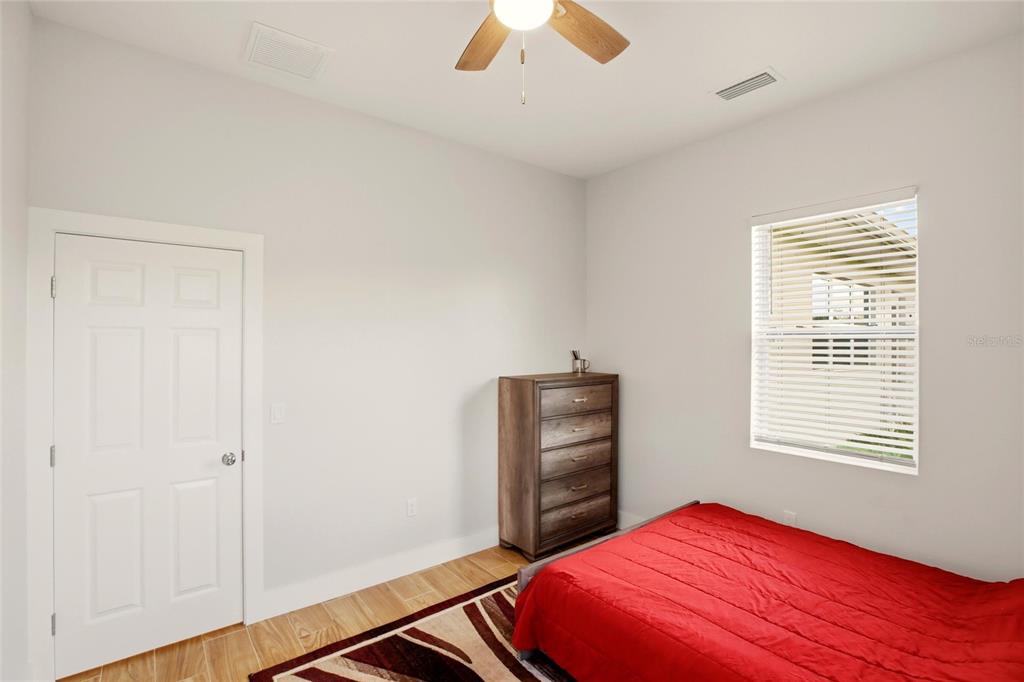 10080 Wauchula Road Myakka City, FL 34251 - Photo 37 of 55 a bedroom with a bed and a window