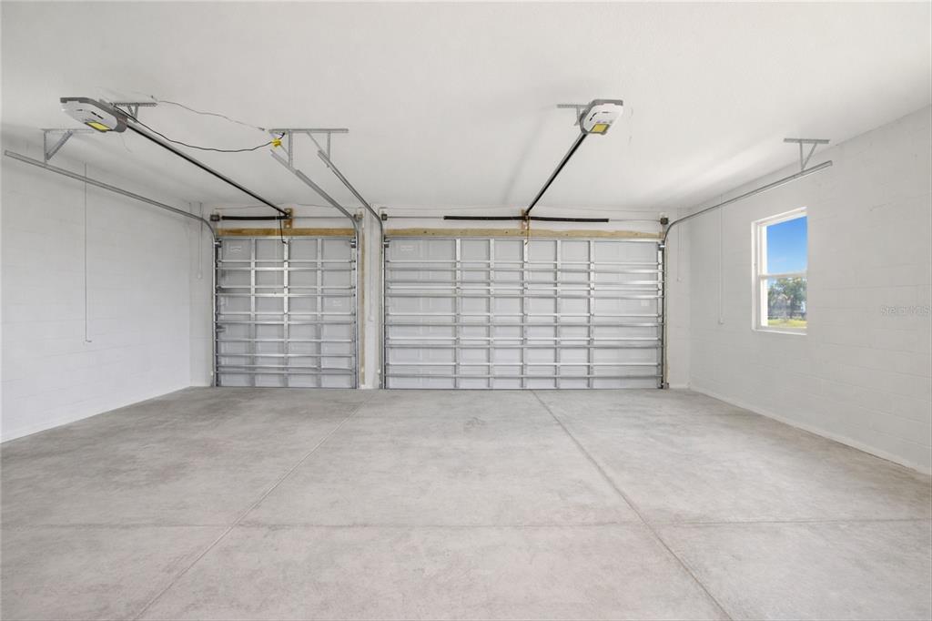 10080 Wauchula Road Myakka City, FL 34251 - Photo 38 of 55 a view of a garage with stairs