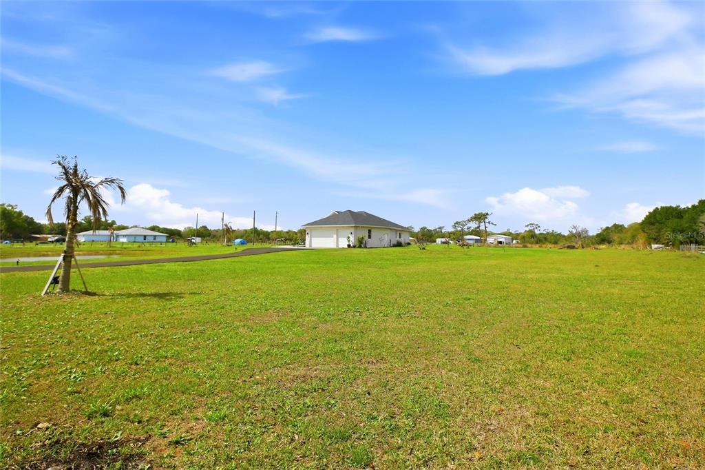10080 Wauchula Road Myakka City, FL 34251 - Photo 45 of 55 a view of a lake with a big yard