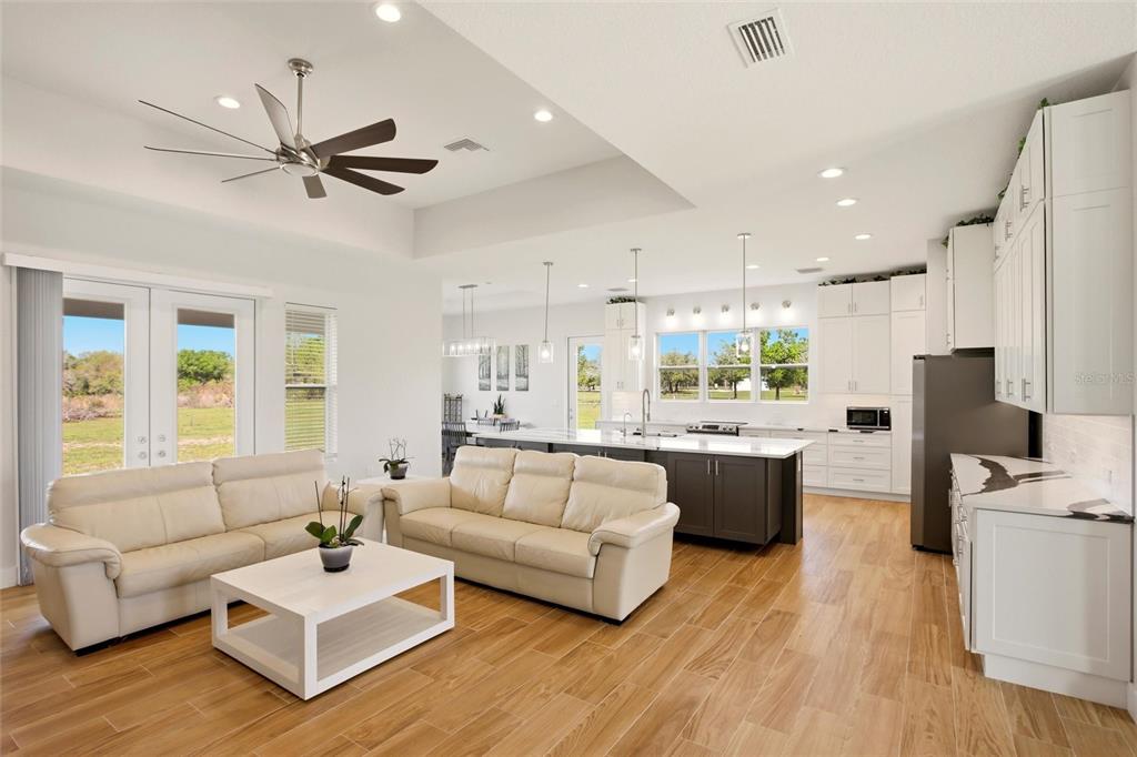 10080 Wauchula Road Myakka City, FL 34251 - Photo 10 of 55 a living room with furniture and a large window