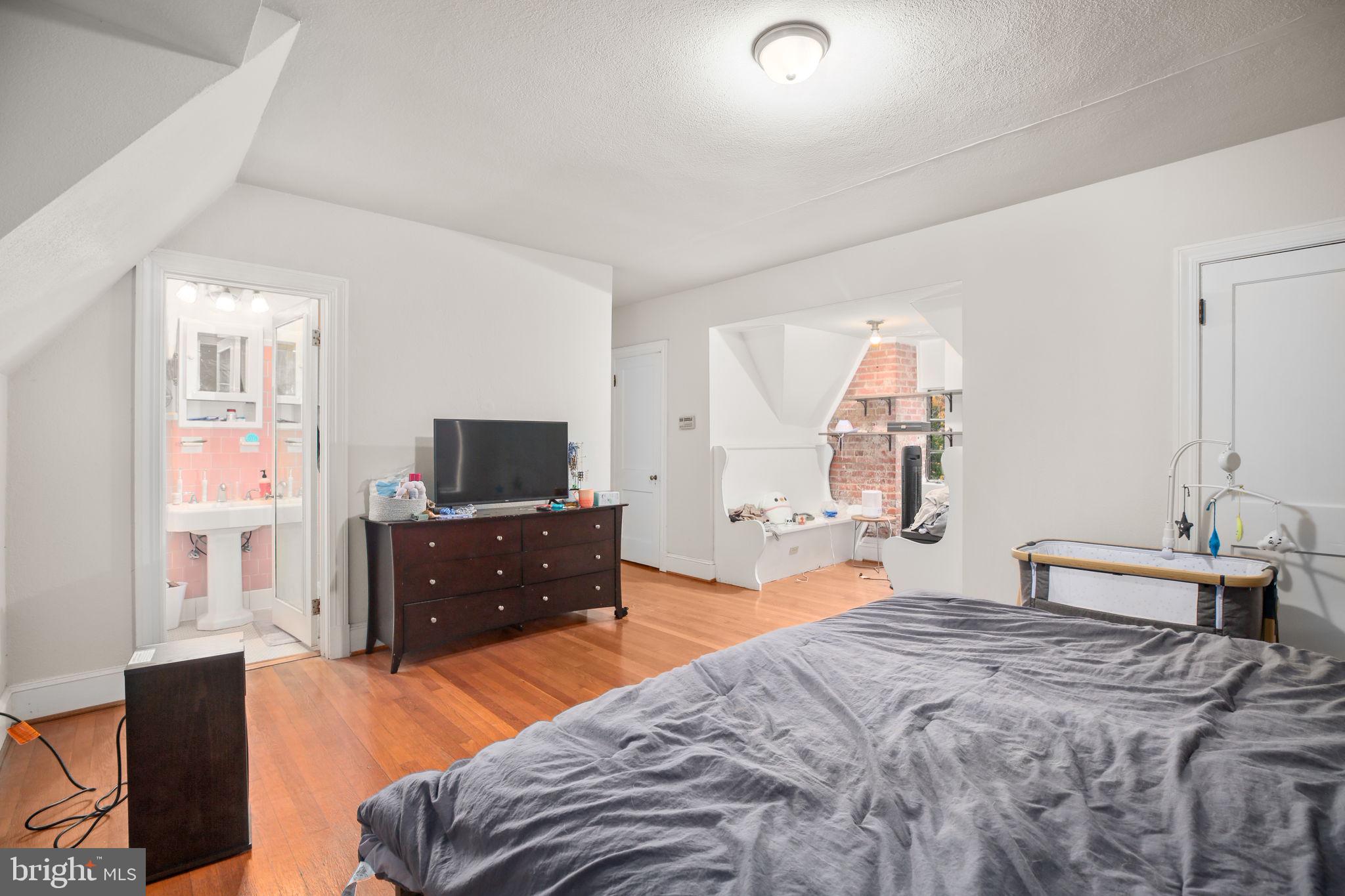 1717 Highland Road Fredericksburg, VA 22401 - Photo 24 of 40 a bedroom with a bed and a television