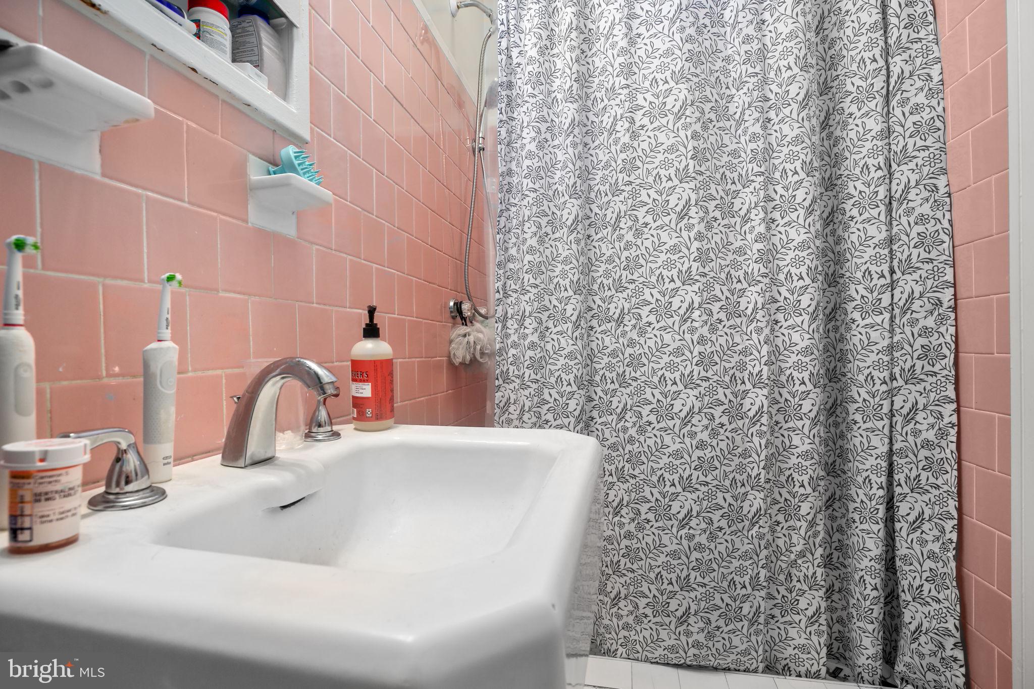 1717 Highland Road Fredericksburg, VA 22401 - Photo 26 of 40 a bathroom with a sink a toilet and shower