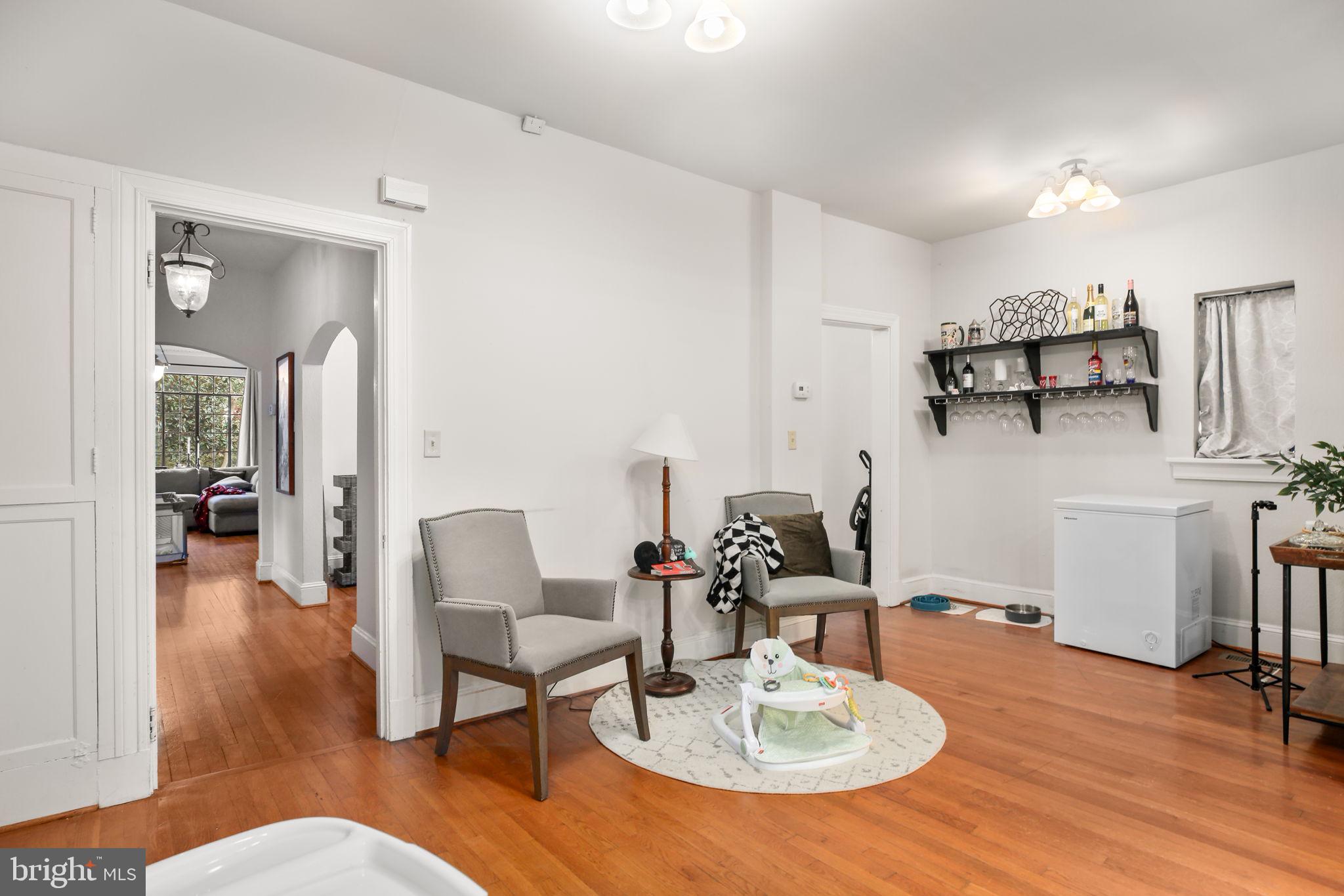 1717 Highland Road Fredericksburg, VA 22401 - Photo 5 of 40 a living room with furniture and a wooden floor