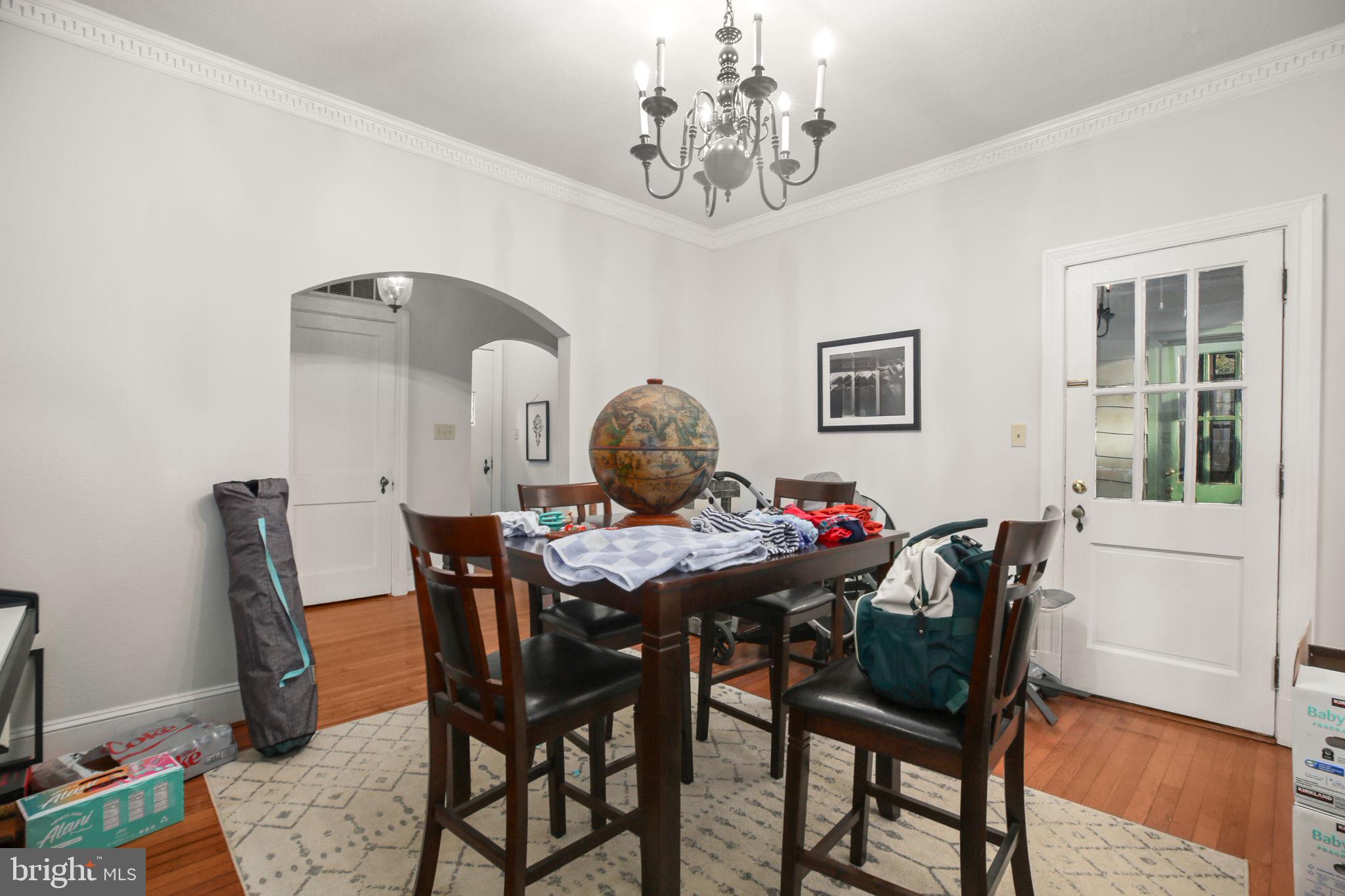1717 Highland Road Fredericksburg, VA 22401 - Photo 9 of 40 a view of a dining room with furniture and chandelier