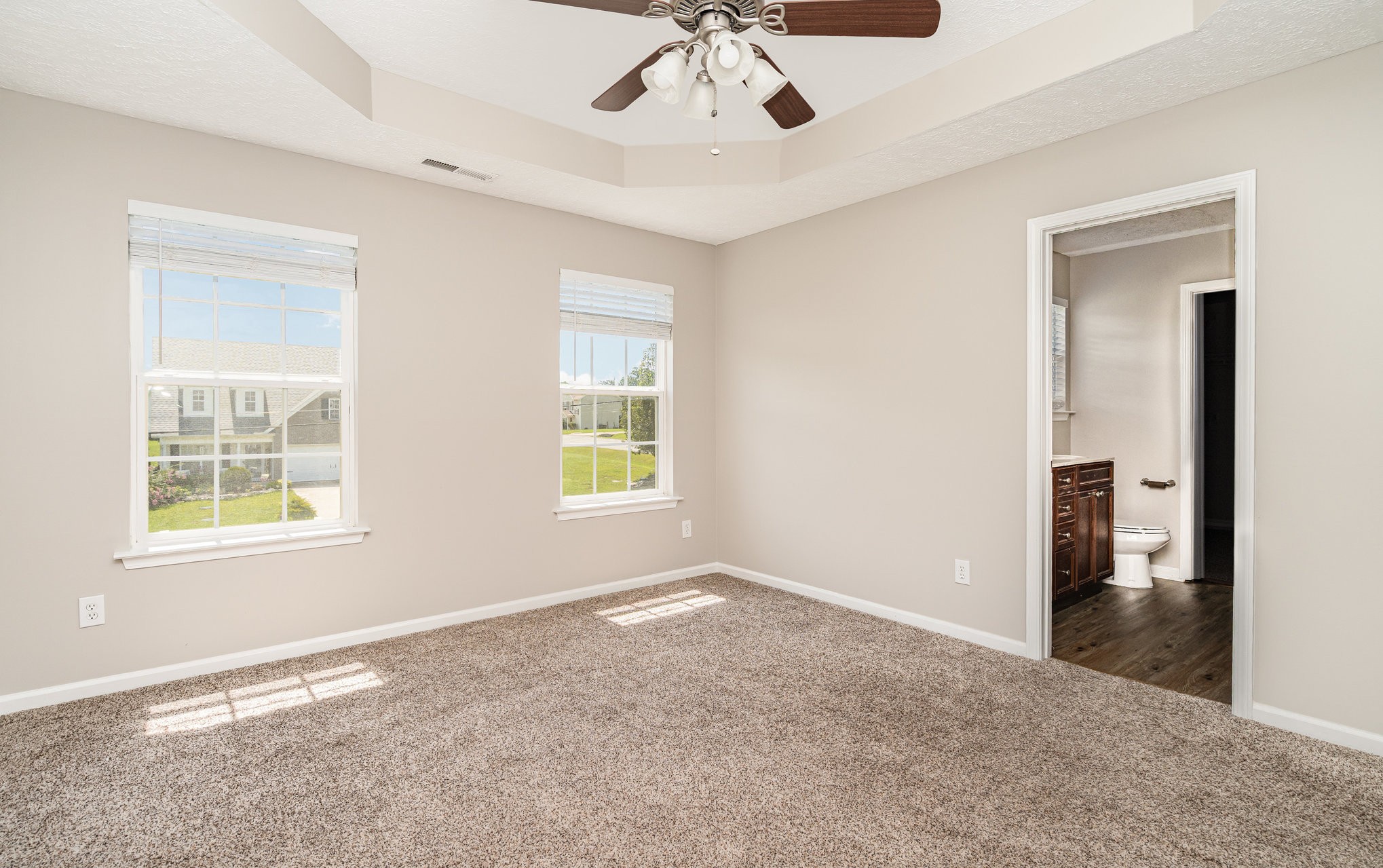 103 Chapel Brook Way Murfreesboro, TN 37129 - Photo 16 of 23 an empty room with windows and ceiling fan