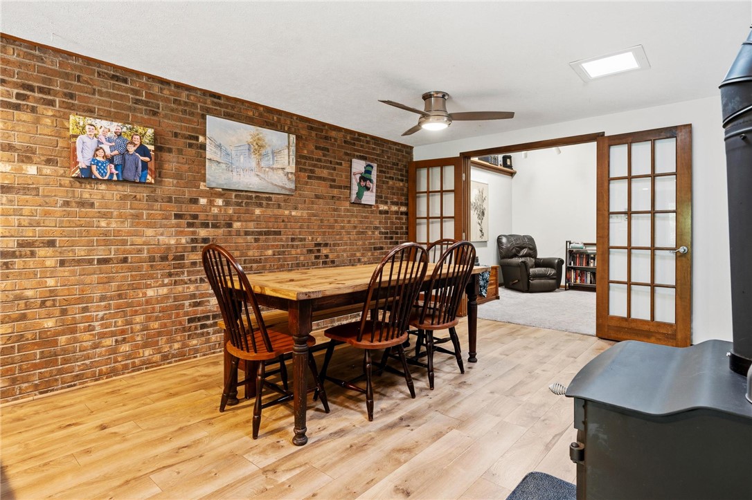 1940 Armstrong Road Fairborn, OH 45324 - Photo 19 of 48 This inviting dining area features brick accents and durable flooring, perfect for gatherings.