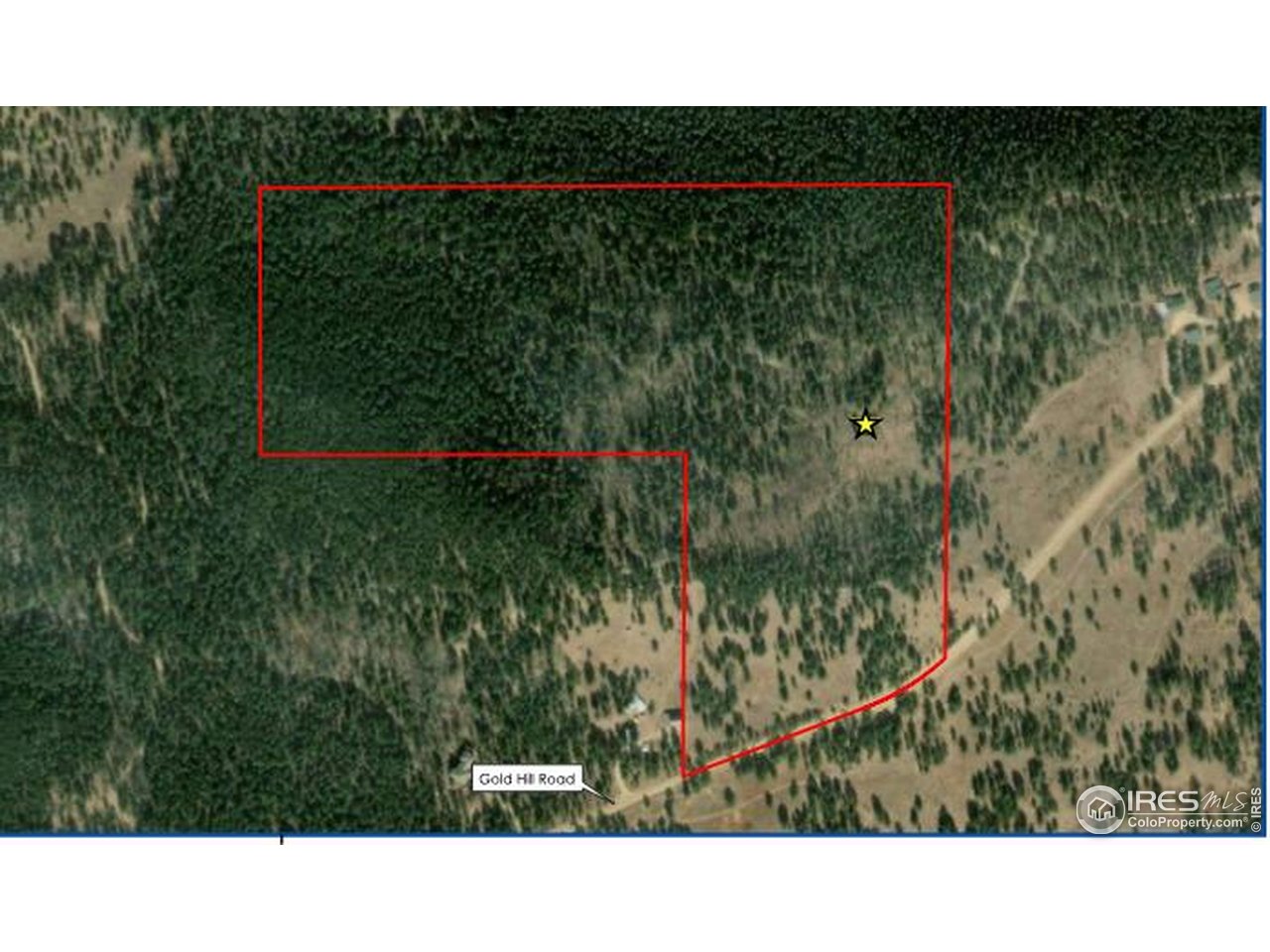 11320 Gold Hill Road Boulder, CO 80302 - Photo 4 of 7 a black and white photo of a green field