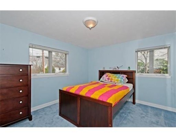 15 Cross Hill Road Newton, MA 02459 - Photo 16 of 25 a room with a bed and a window