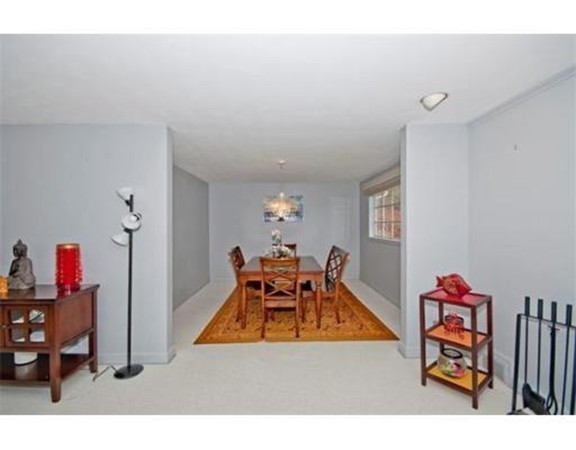 15 Cross Hill Road Newton, MA 02459 - Photo 5 of 25 a living room with furniture and a wooden floor