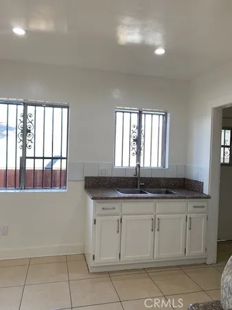 a bathroom with a shower and a bath tub