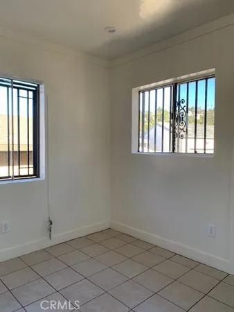 a view of an empty room and closet