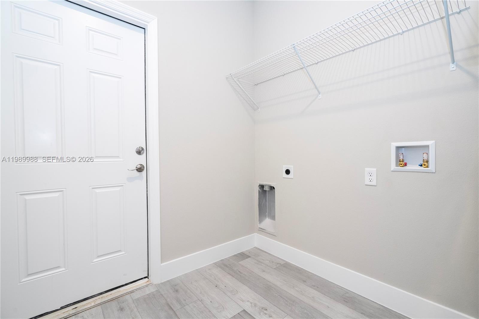 7916 Granada Road Sebring, FL 33876 - Photo 29 of 60 a view of a small space with wooden floor