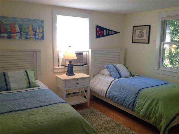 58 Doane Road Chatham, MA 02633 - Photo 13 of 24 a bedroom with a bed and window