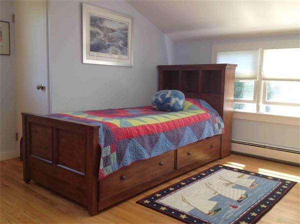 58 Doane Road Chatham, MA 02633 - Photo 14 of 24 a bedroom with a bed and window