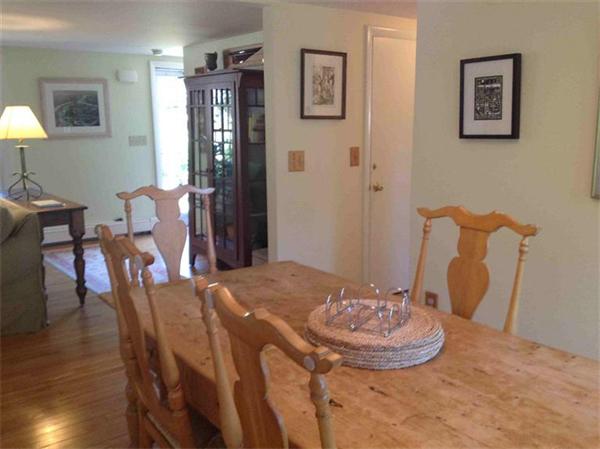 58 Doane Road Chatham, MA 02633 - Photo 5 of 24 a view of a dining room with furniture