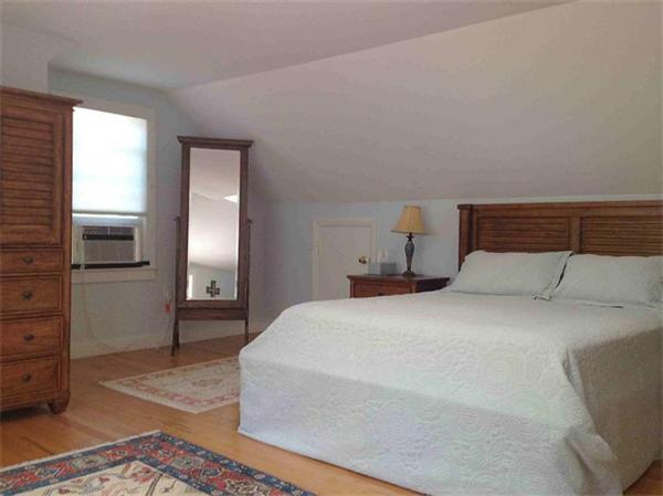 58 Doane Road Chatham, MA 02633 - Photo 10 of 24 a bedroom with a bed and closet