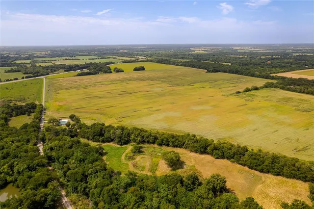 a view of an ocean and a mountain