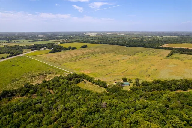 a view of an ocean and city