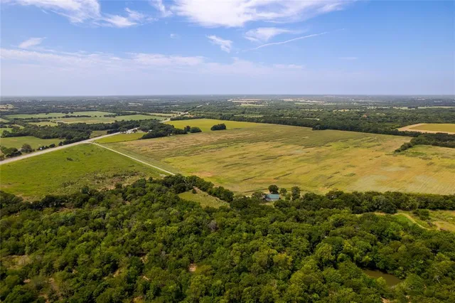 a view of an ocean and city