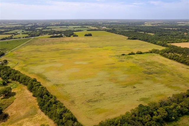 a view of an ocean and a mountain