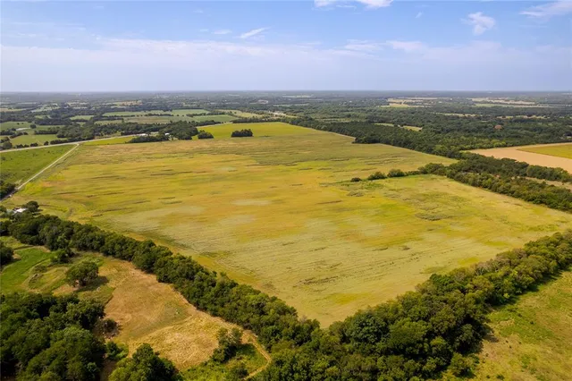 a view of an ocean from a city