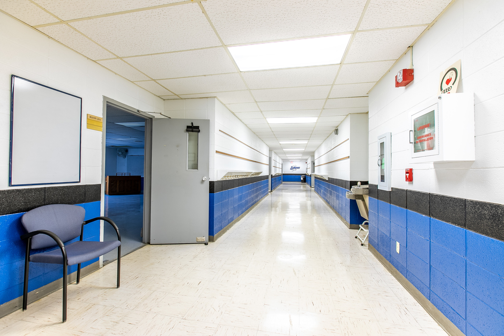 1275 Main Street Antioch, IL 60002 - Photo 16 of 29 a living room with stainless steel appliances kitchen island granite countertop furniture and a kitchen view