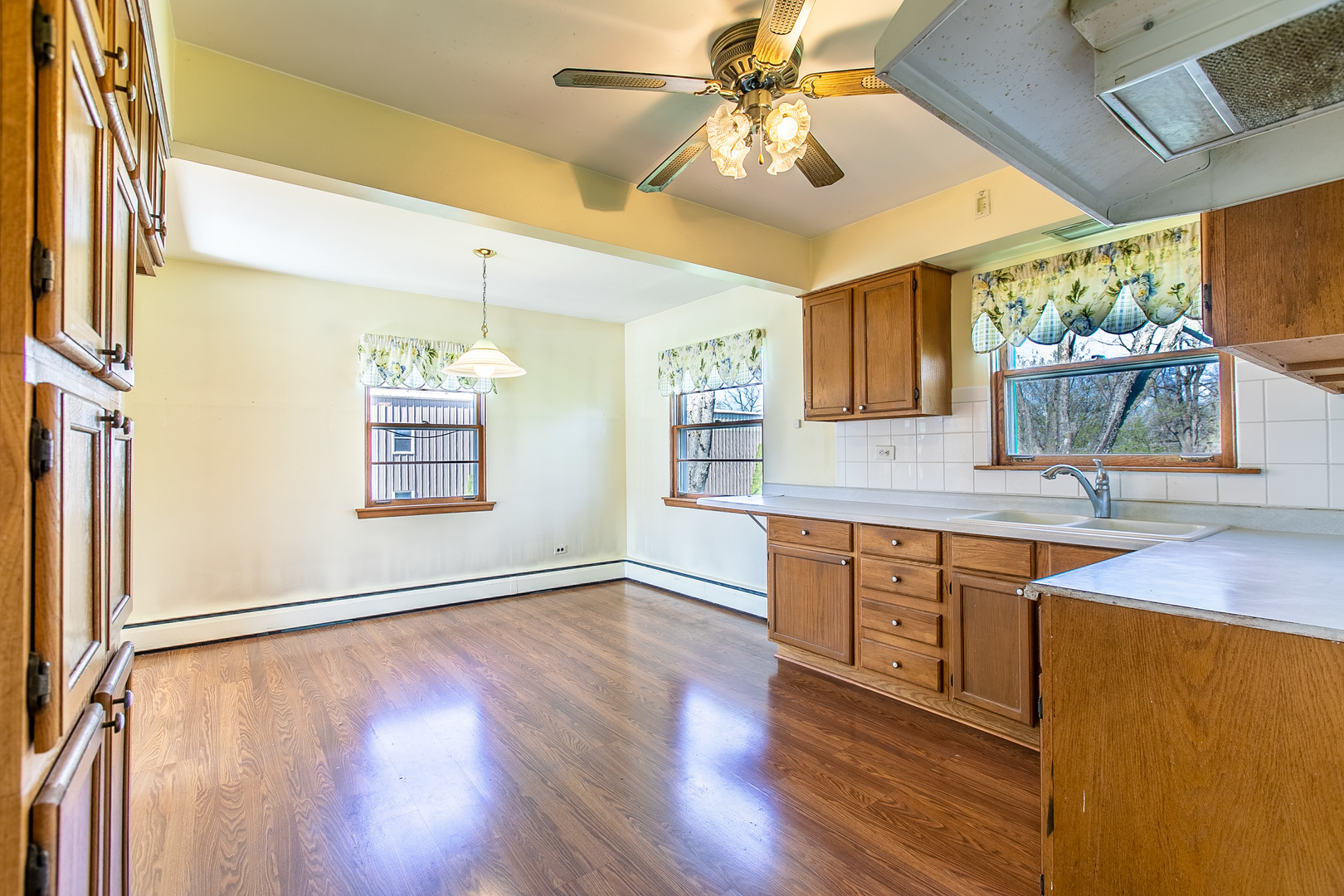 1275 Main Street Antioch, IL 60002 - Photo 23 of 29 a spacious bathroom with a granite countertop sink mirror and a shower