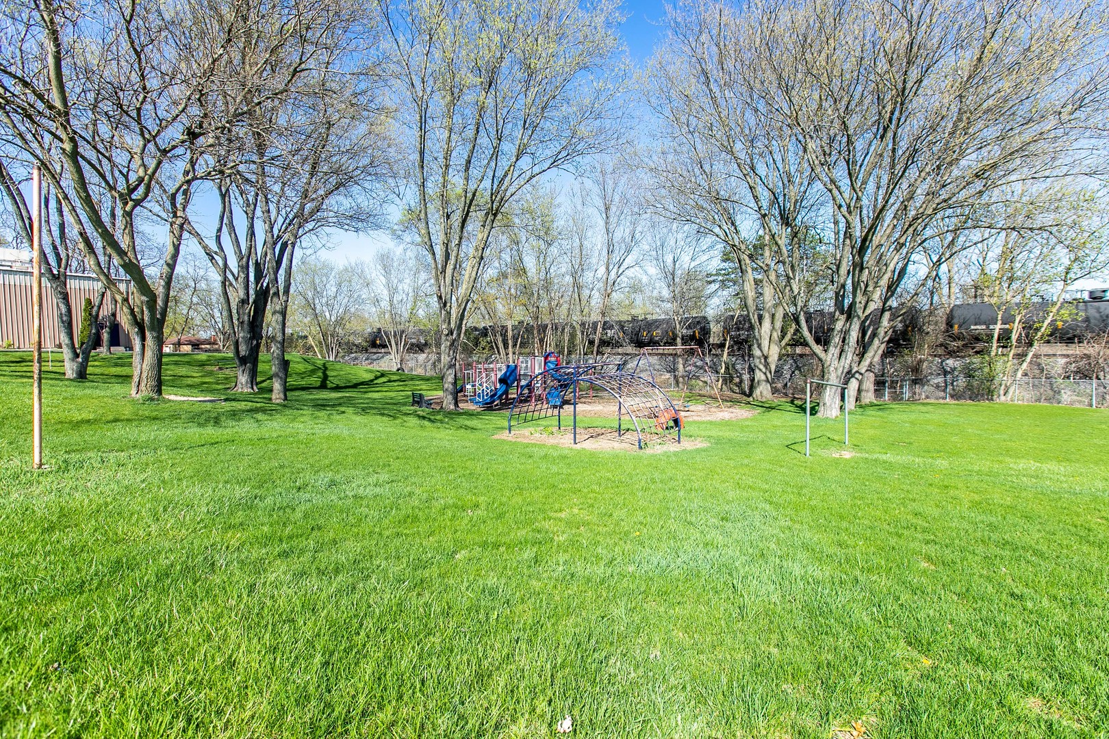 1275 Main Street Antioch, IL 60002 - Photo 27 of 29 a front view of a building with garden