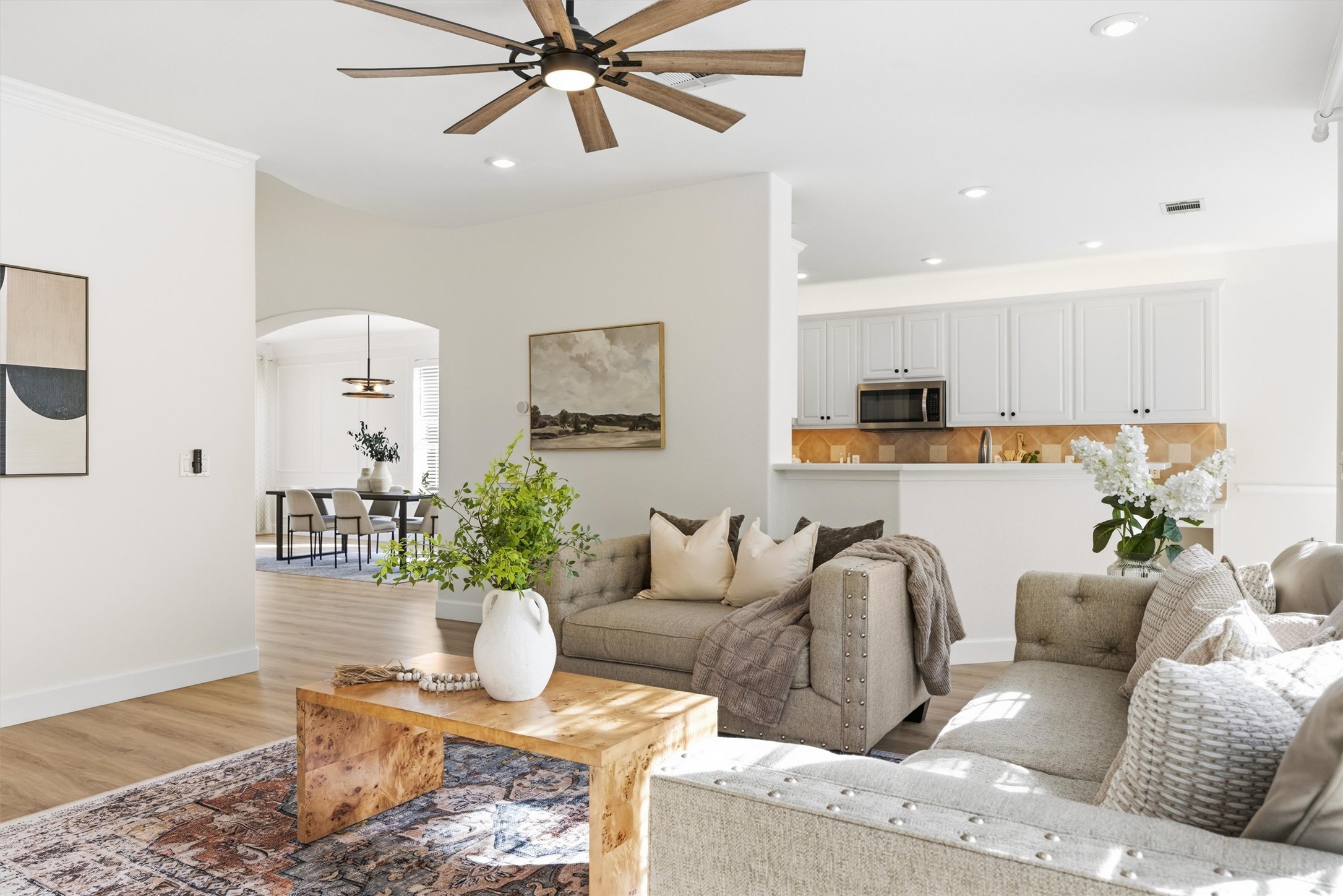 9400 Savannah Ridge Drive Austin, TX 78726 - Photo 14 of 35 a living room with furniture kitchen view and a potted plant