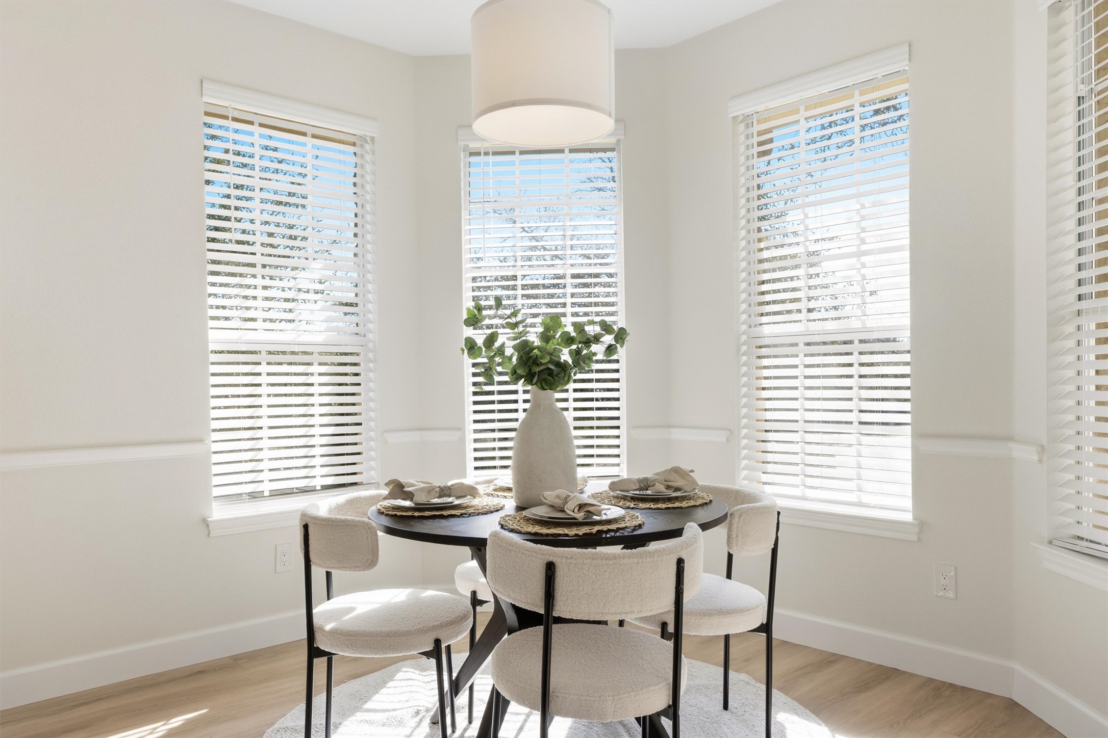 9400 Savannah Ridge Drive Austin, TX 78726 - Photo 15 of 35 a view of a dining room with furniture and windows