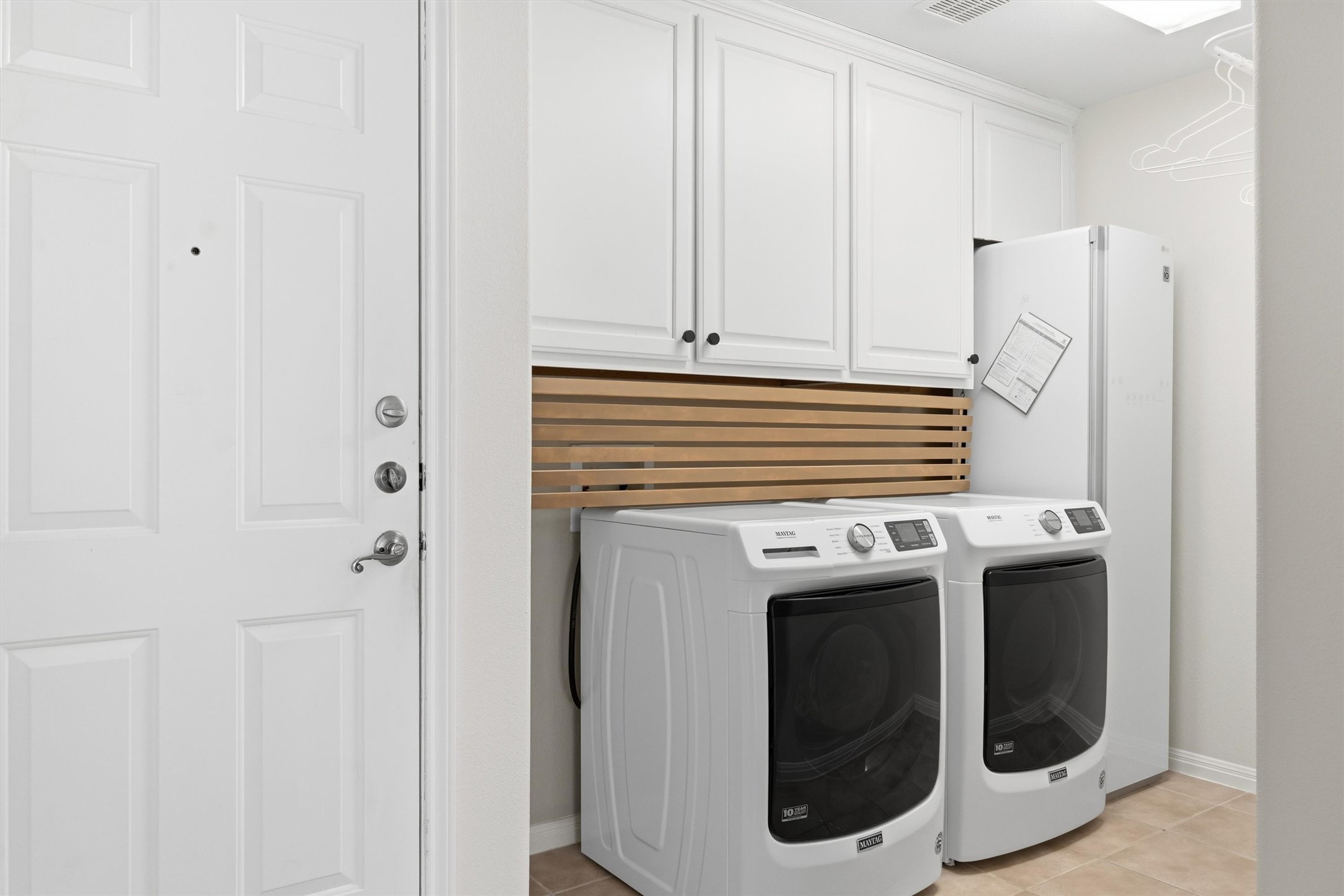 9400 Savannah Ridge Drive Austin, TX 78726 - Photo 20 of 35 a utility room with dryer and washer