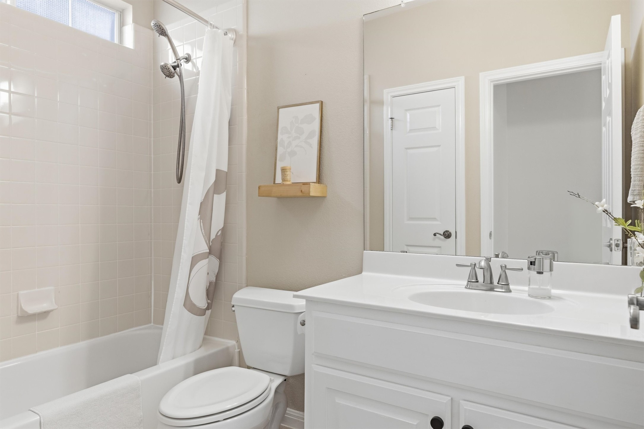 9400 Savannah Ridge Drive Austin, TX 78726 - Photo 21 of 35 a bathroom with a sink toilet and shower