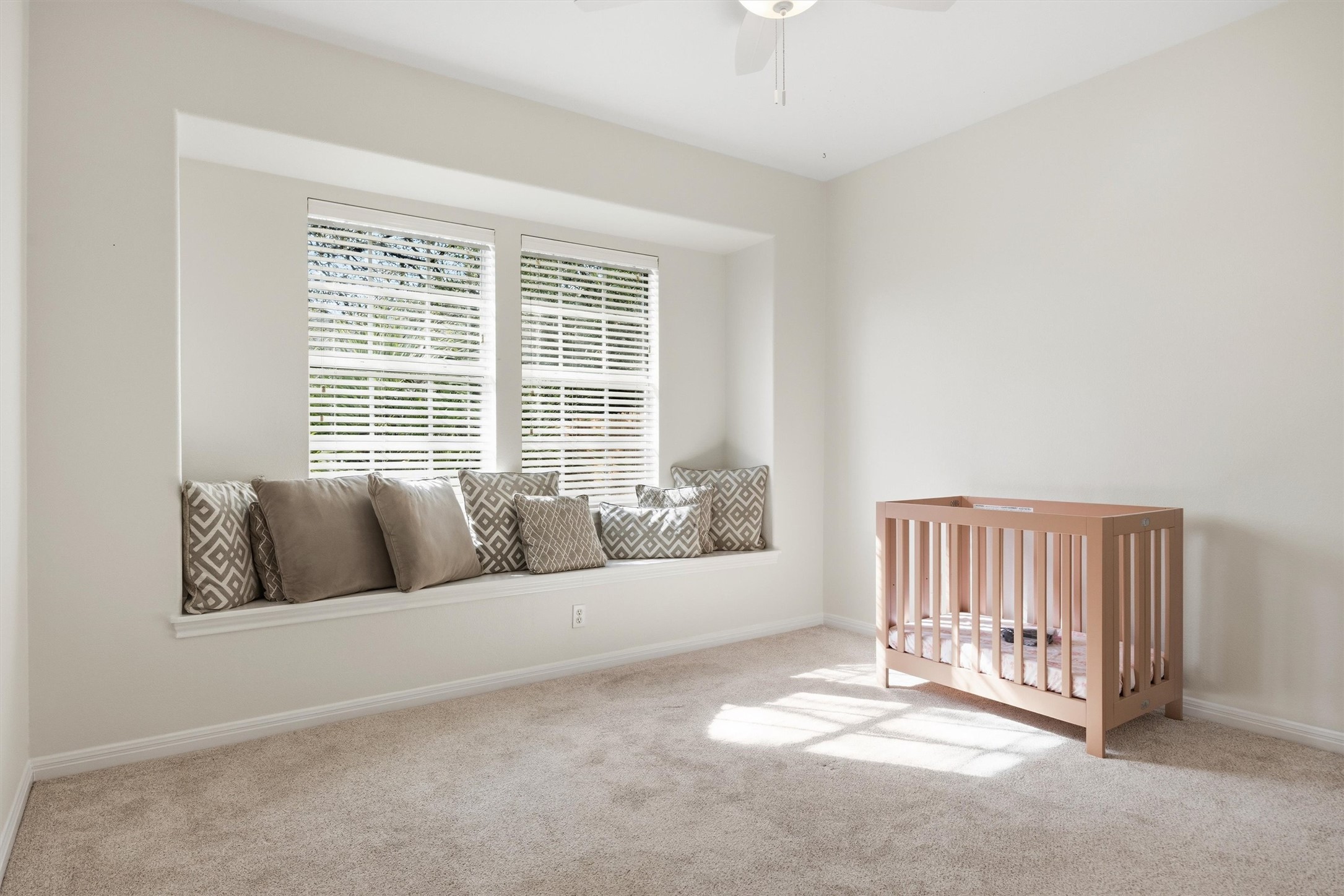 9400 Savannah Ridge Drive Austin, TX 78726 - Photo 22 of 35 a living room with a couch and a window