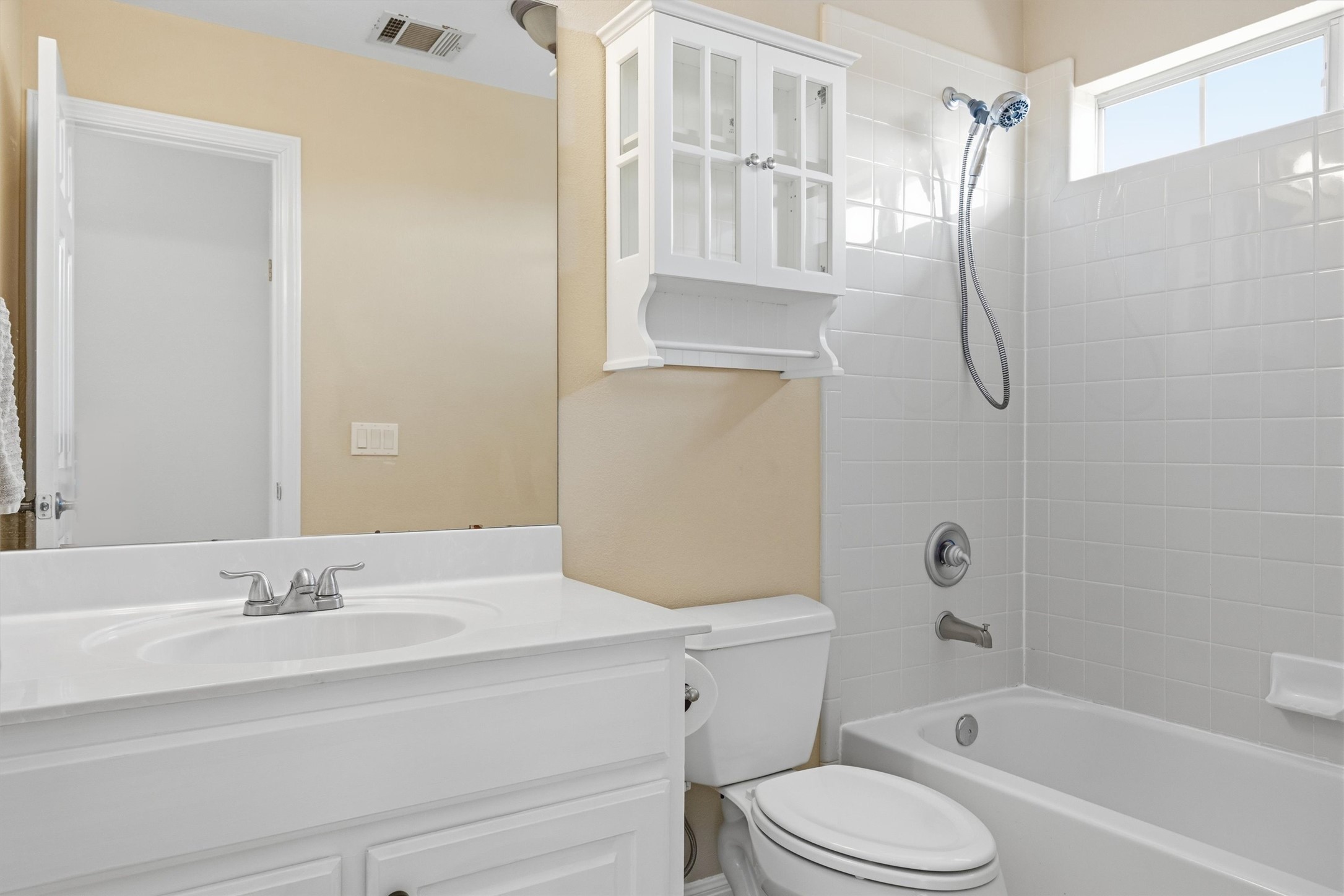 9400 Savannah Ridge Drive Austin, TX 78726 - Photo 26 of 35 a bathroom with a granite countertop sink toilet and shower