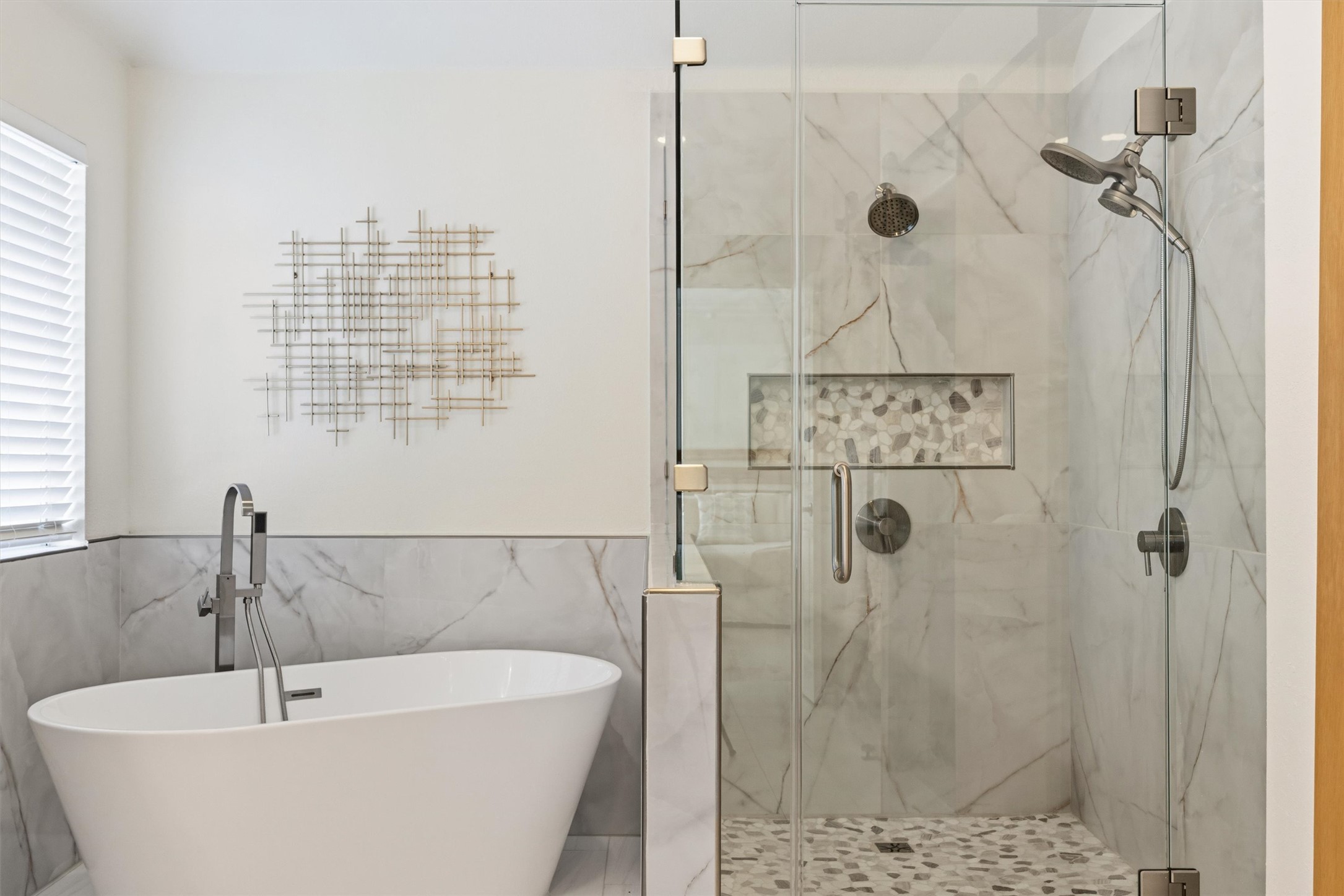 9400 Savannah Ridge Drive Austin, TX 78726 - Photo 34 of 35 a bathroom with a white bath tub a shower and a sink