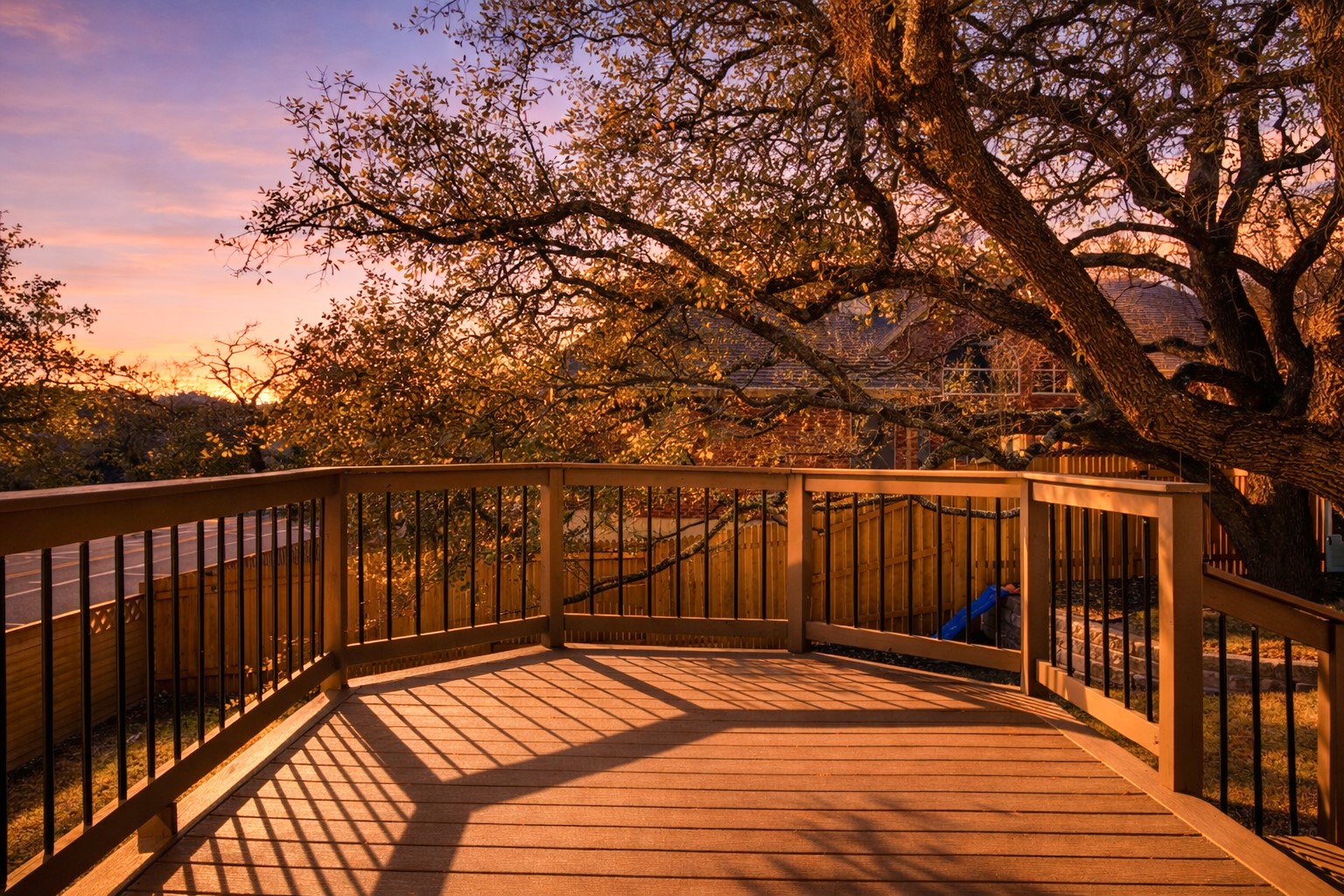 9400 Savannah Ridge Drive Austin, TX 78726 - Photo 4 of 35 a view of balcony with wooden floor and fence