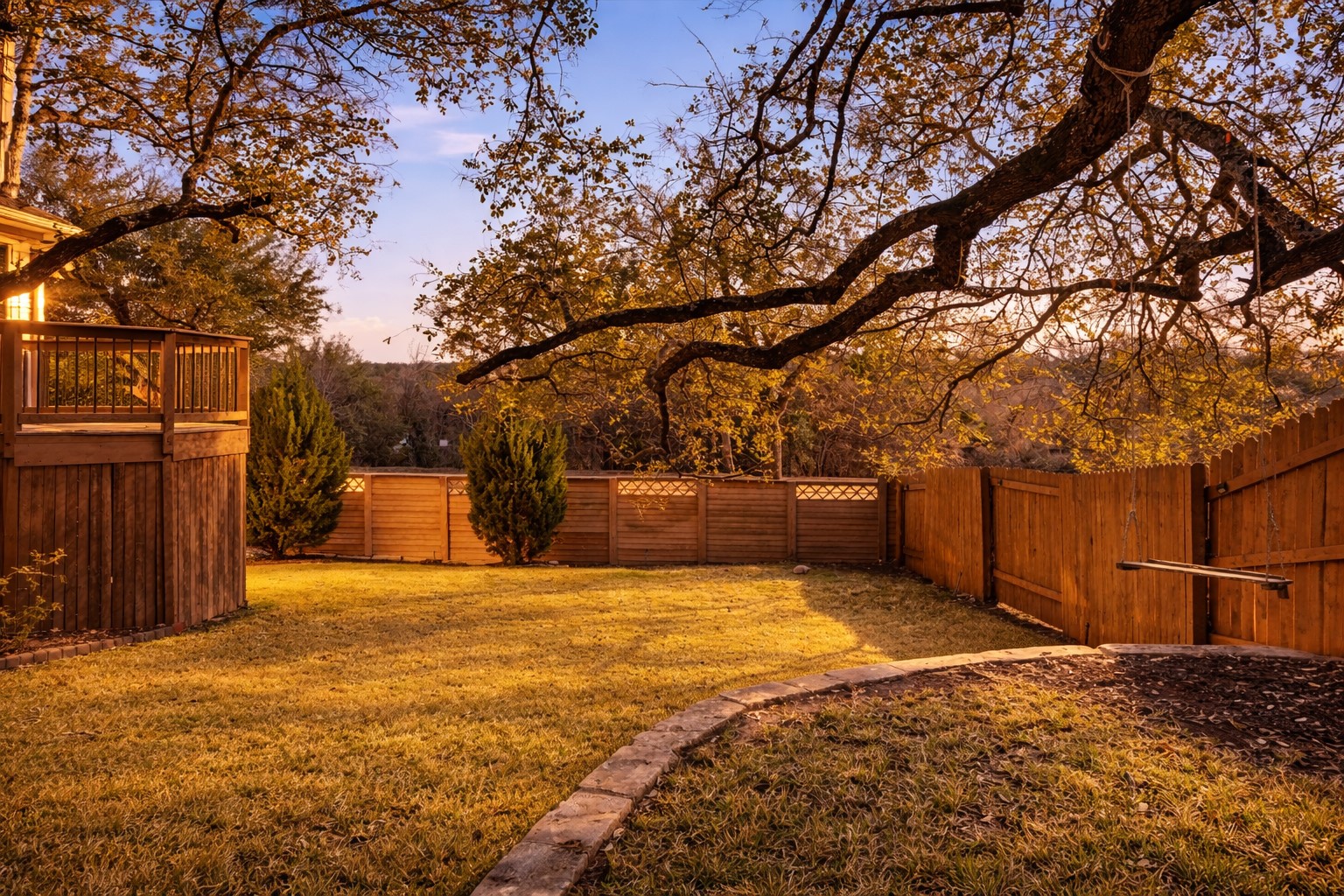 9400 Savannah Ridge Drive Austin, TX 78726 - Photo 5 of 35 a view of a yard with wooden fence